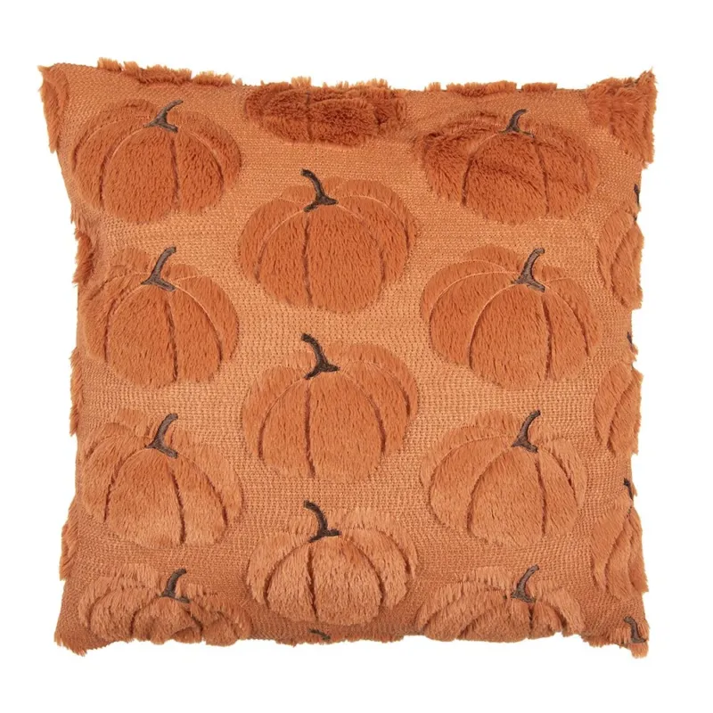 Orangenes Dekokissen mit flauschigen Kürbisen