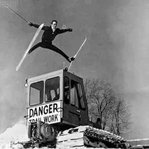 Jumping Over Snowcat Vintage Skiing Photo