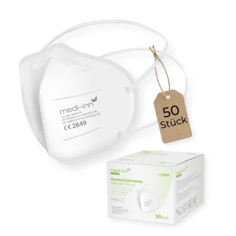 Frontalansicht einer Medi-Inn FFP2 Maske neben der Verpackung mit 50 Stück.